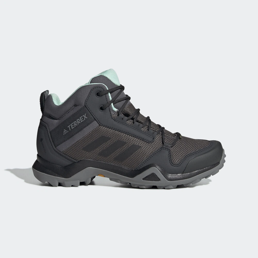 Adidas TERREX AX3 Mid GTX Donna: Avventura senza limiti, stile audace! Escursioni indimenticabili, design impeccabile.